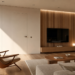 Puerta oculta integrada en un salón moderno con panelado de madera realizado mediante carpintería a medida.